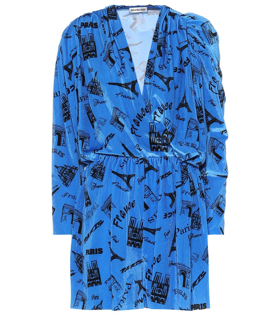 Click to view more detailed imagery on our partner's website Balenciaga Tourist Print Long Sleeve Stretch Velvet Romper In Blue