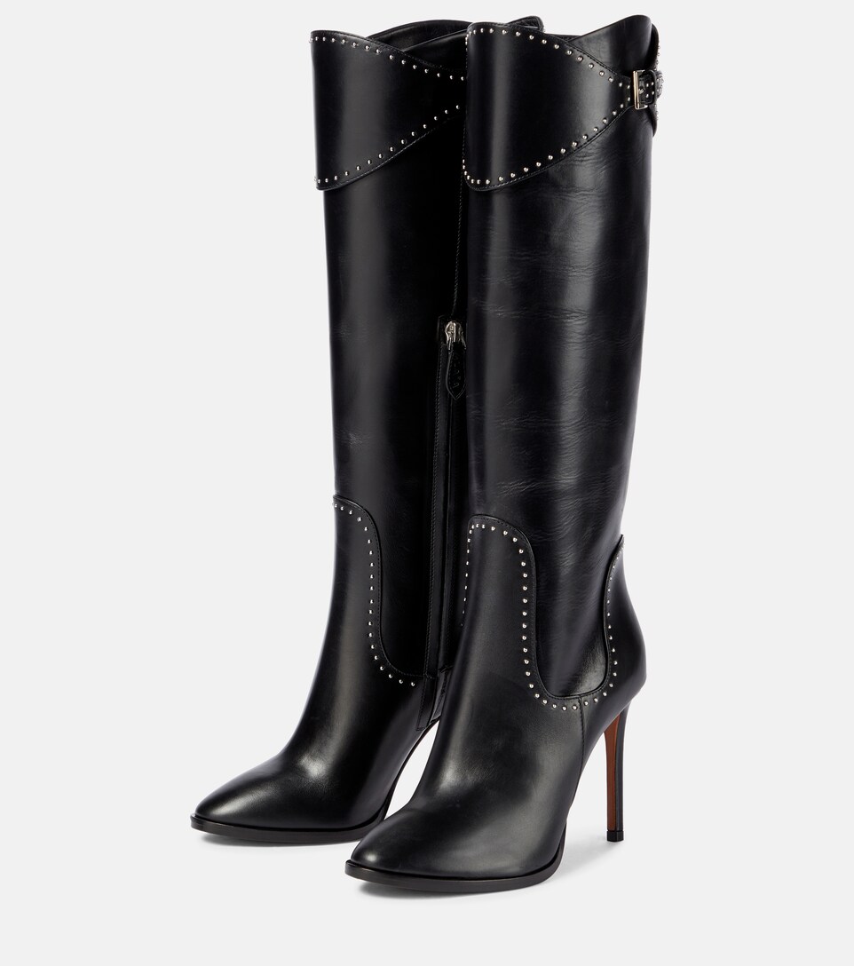 Alaïa - Botas altas de piel con tachuelas | Mytheresa