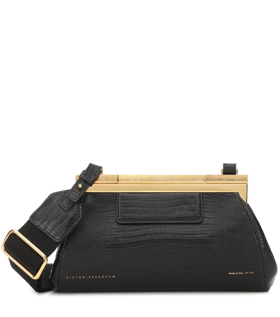Click to view more detailed imagery on our partner's website Victoria Beckham Frame Lizard-Effect Leather Clutch In Black
