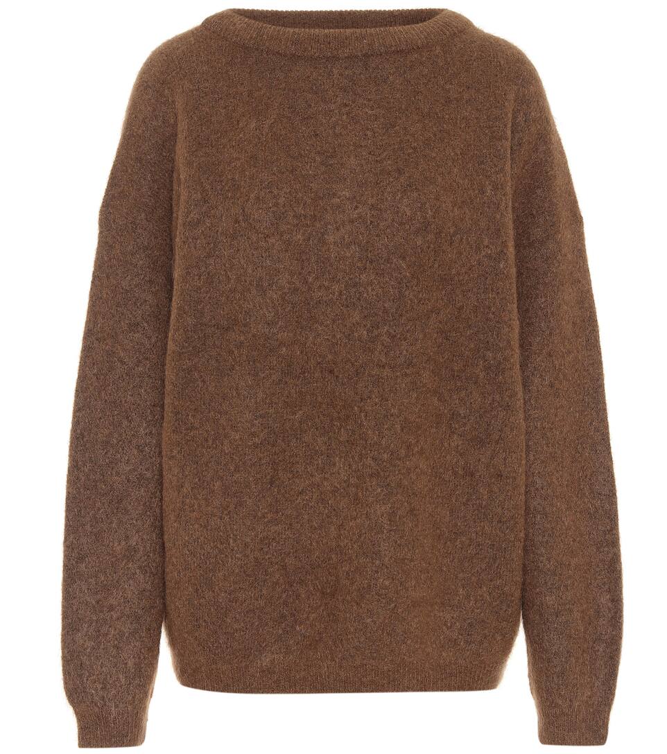 black sweater with gold buttons