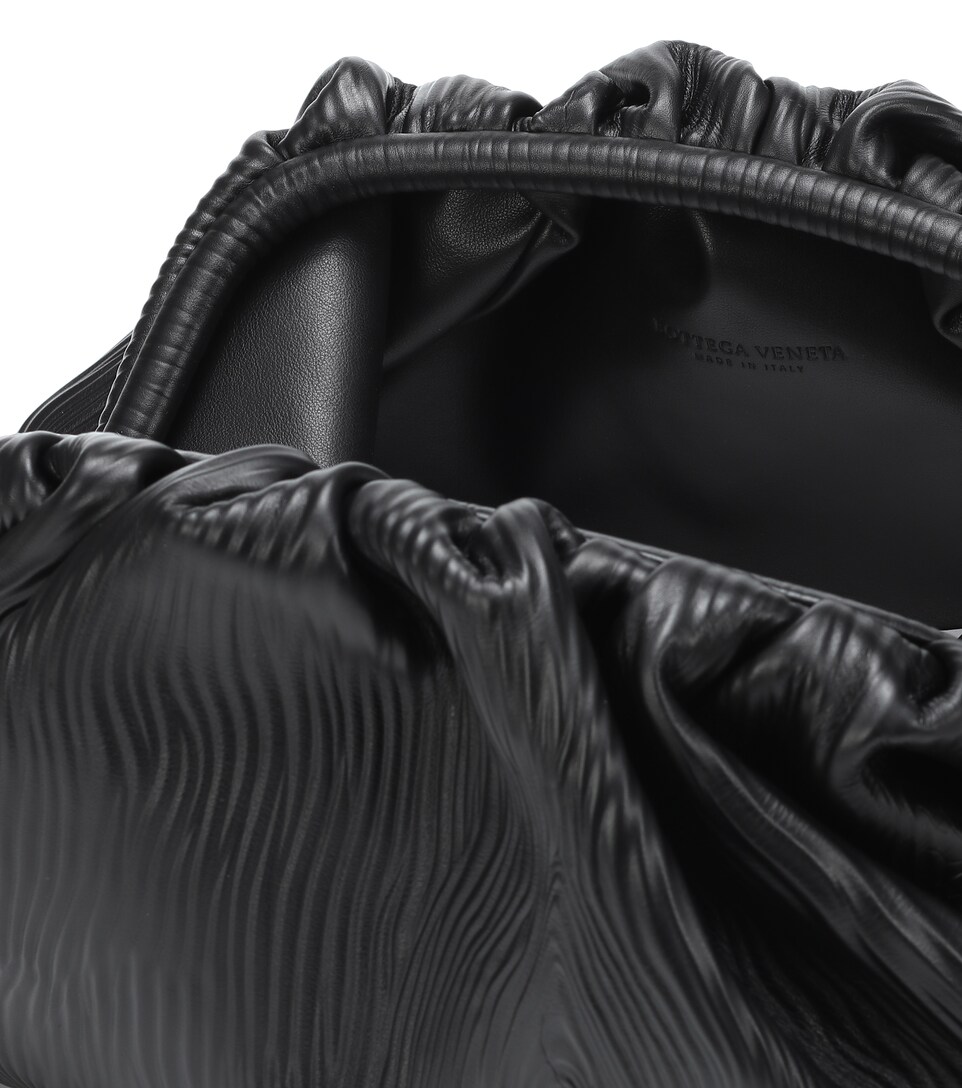 embossed leather clutch