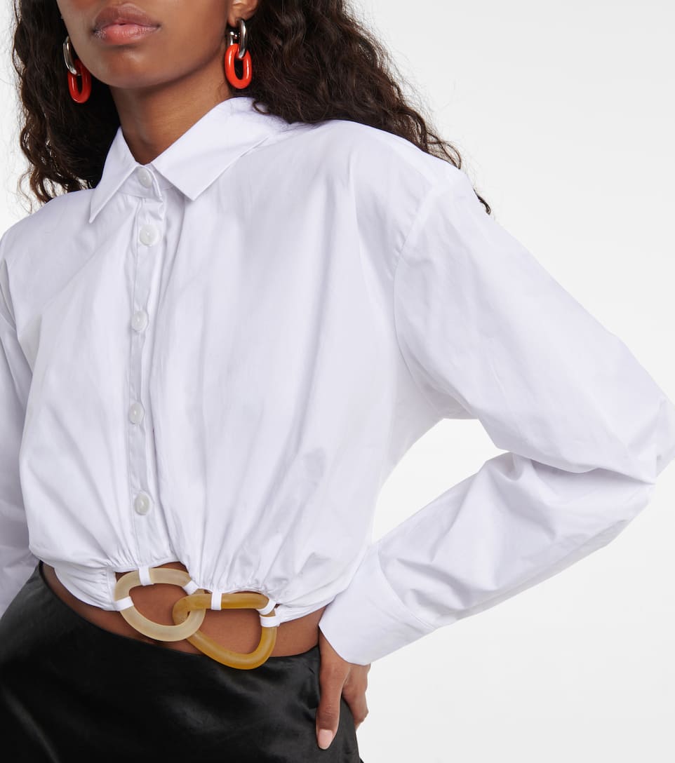 White long sleeve Cotton Christopher Esber Cropped shirt, features interlocking resin hoops at the hem with regular shirt button fastening and collar.  