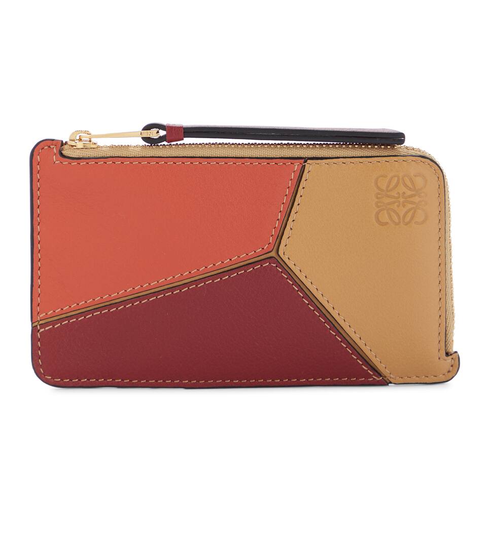 loewe coin case Hi Tech Services