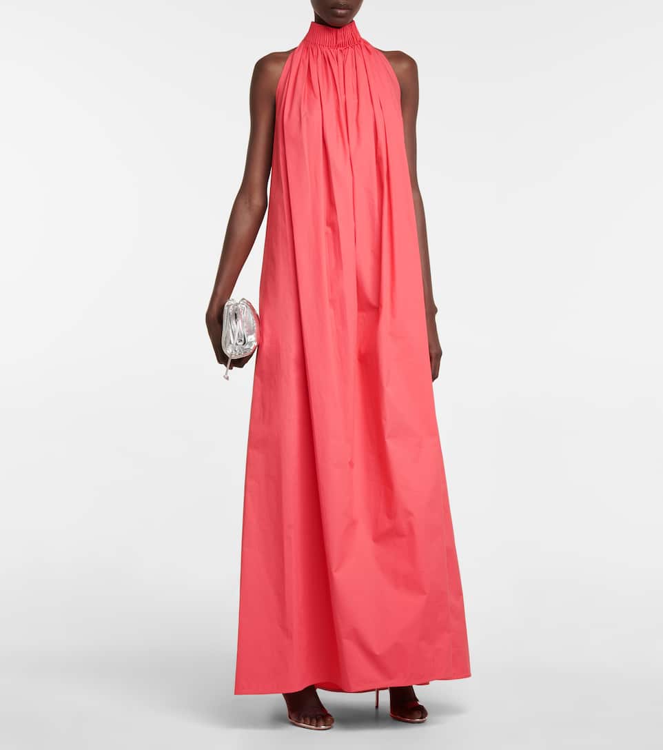 Pink maxi dress from Roksanda is an effortlessly chic choice for summer events. It's made from cotton and cut to a ruched, high neckline and cascades to a relaxed A-line silhouette.