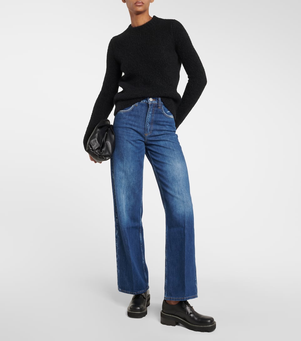 Frame high rise wide-legged cropped jeans. Ideal for a warm-weather outing, these cropped jeans from Frame are your next favourite sunny-day pair. This style sits high at the waist and drapes into a cropped wide-leg silhouette.