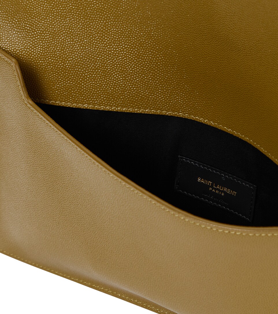 Saint Laurent - Uptown Small leather clutch | Mytheresa