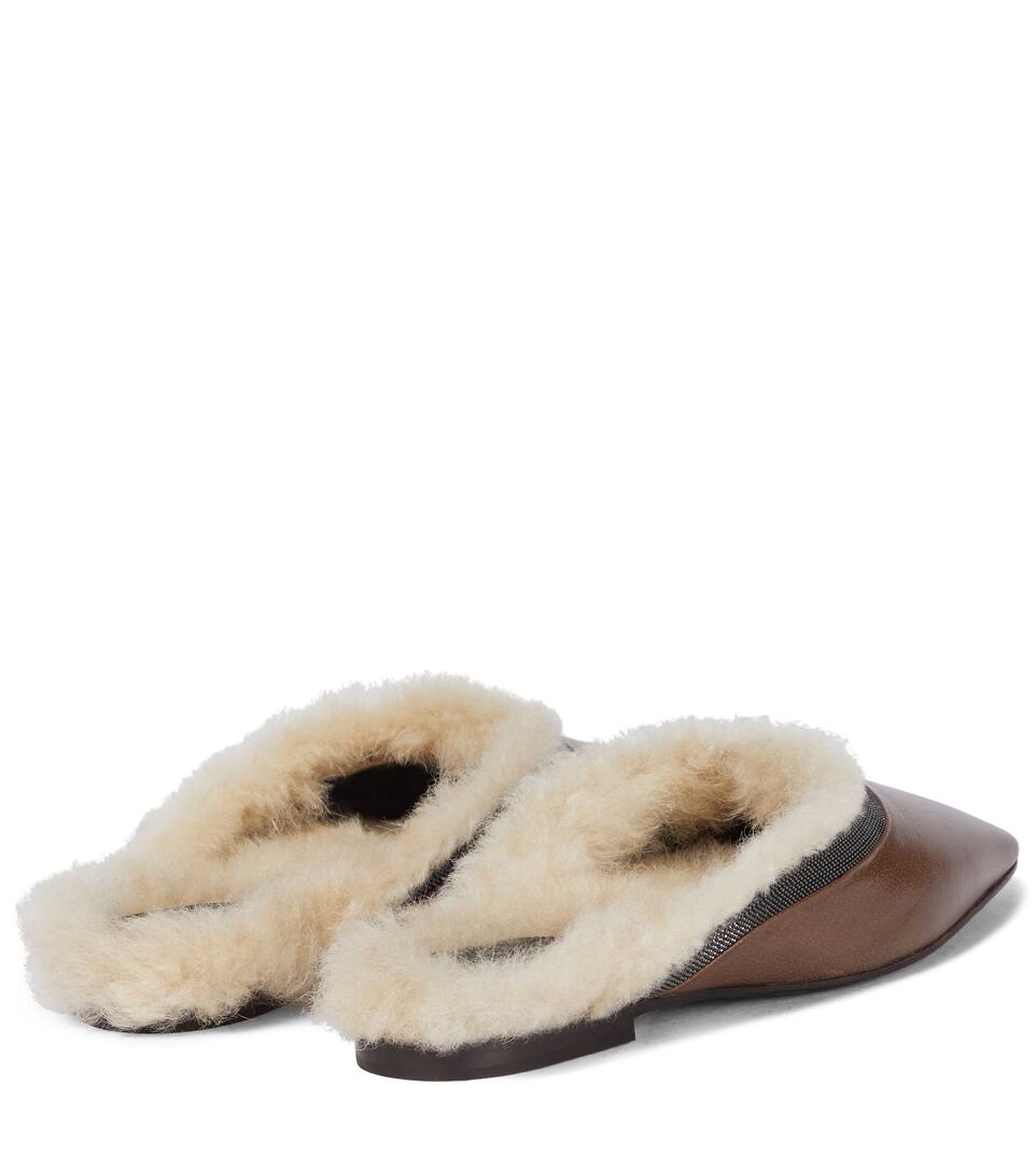 Leather and shearling slippers Leather and shearling slippers