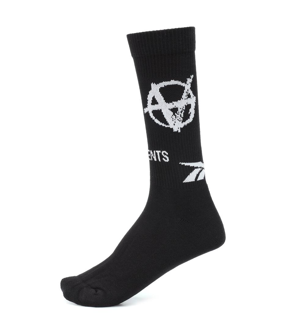 tutina reebok neonato