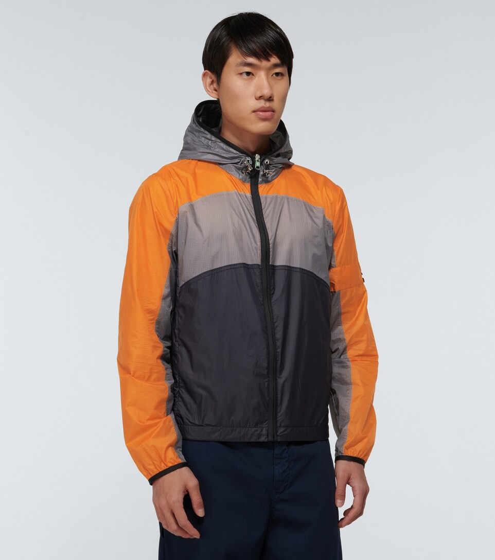 green windbreaker jacket