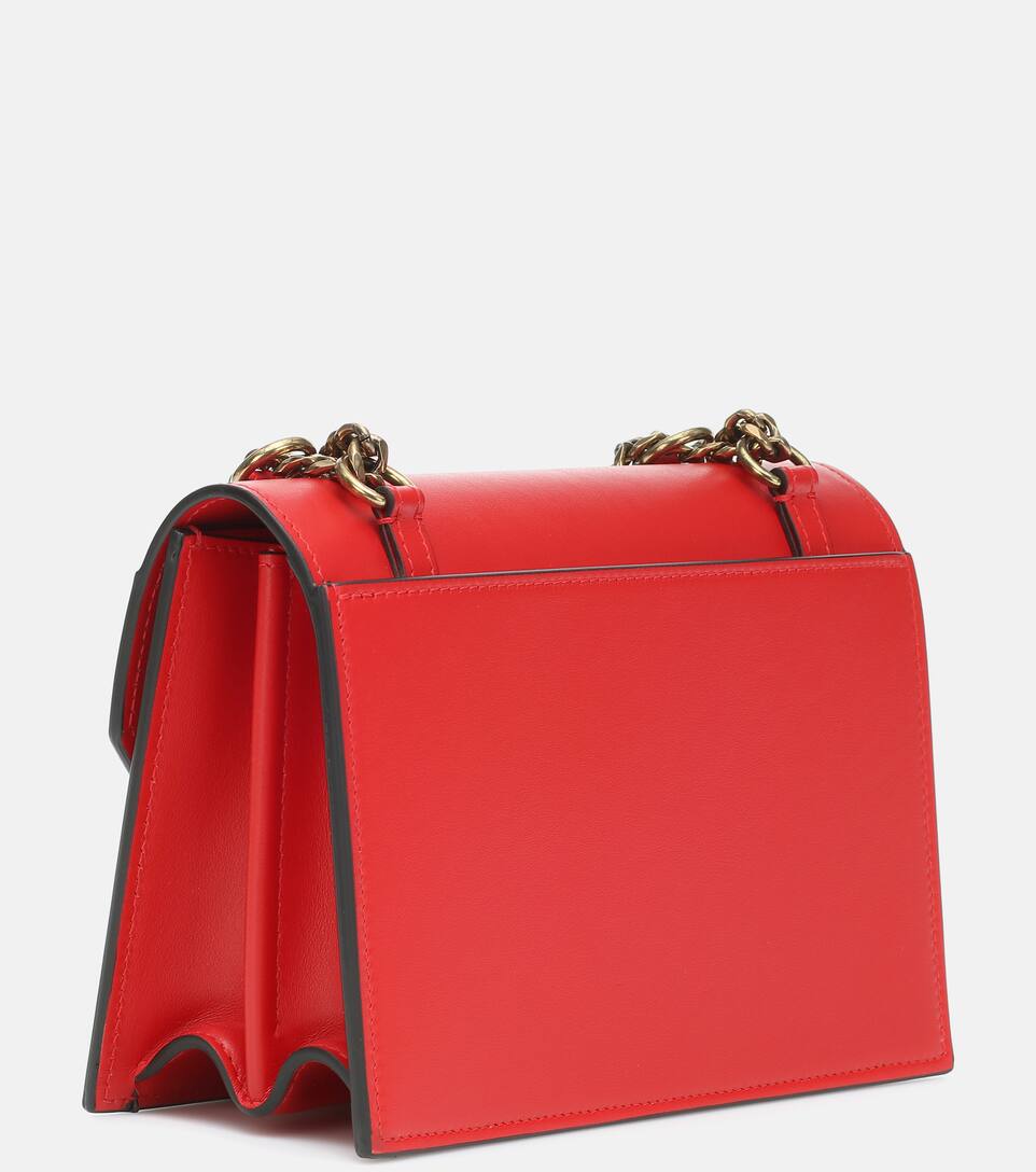 red bottoms purse
