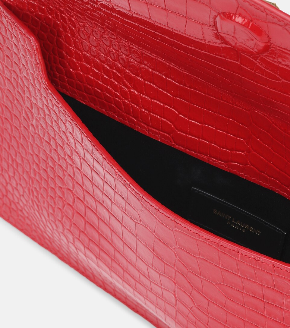 uptown croc embossed leather clutch