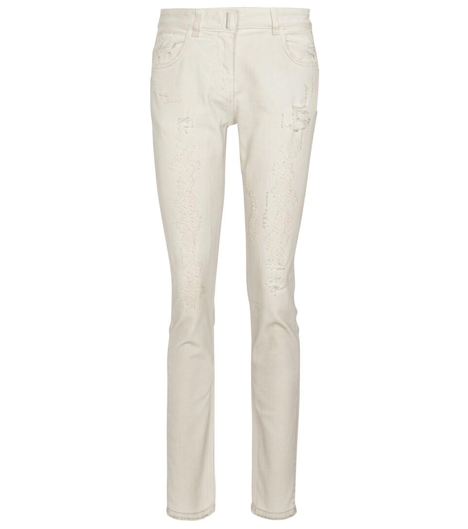 Distressed mid-rise skinny jeans 