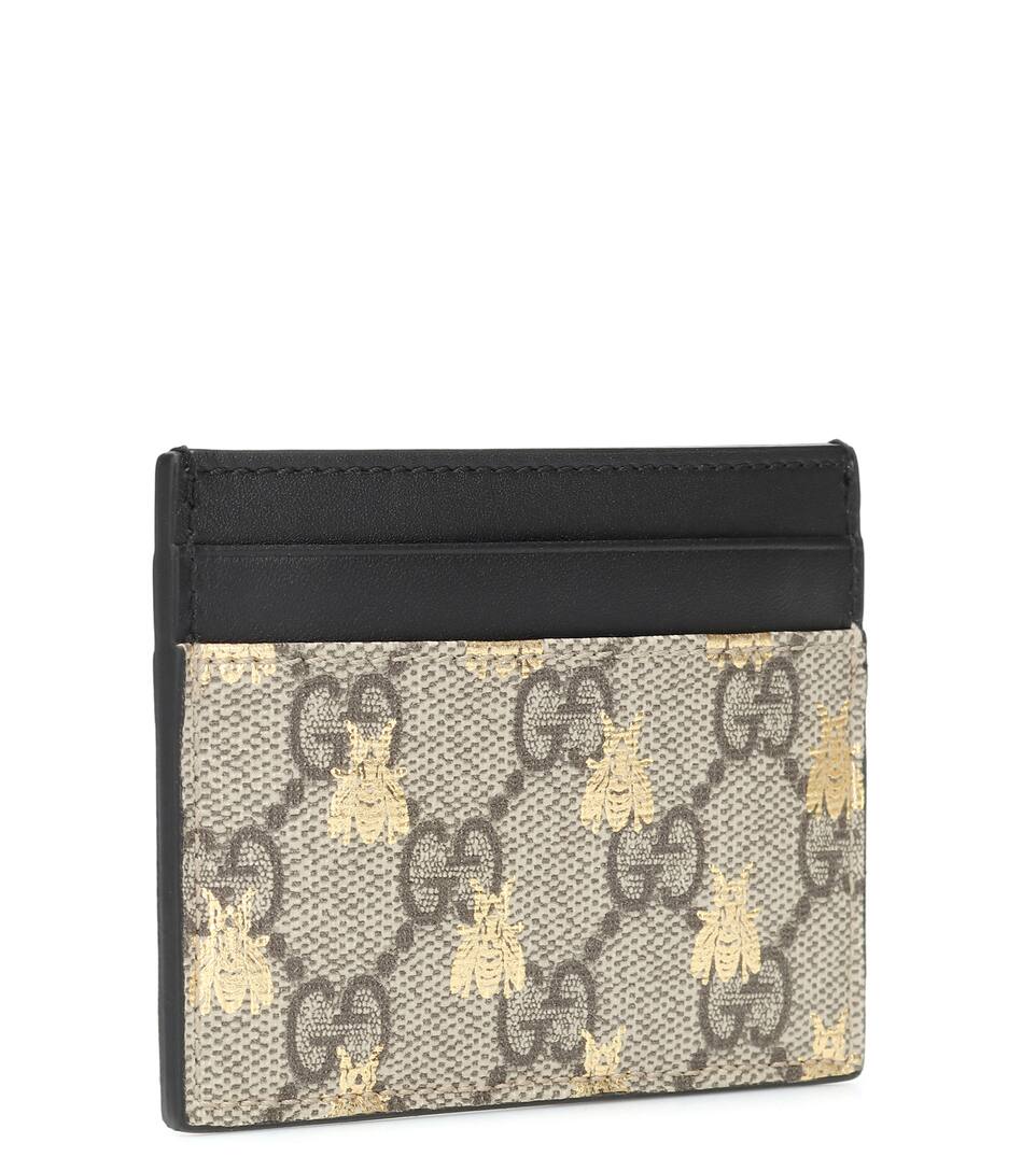 shop gucci gg supreme bees card holder in beige shop gucci gg supreme