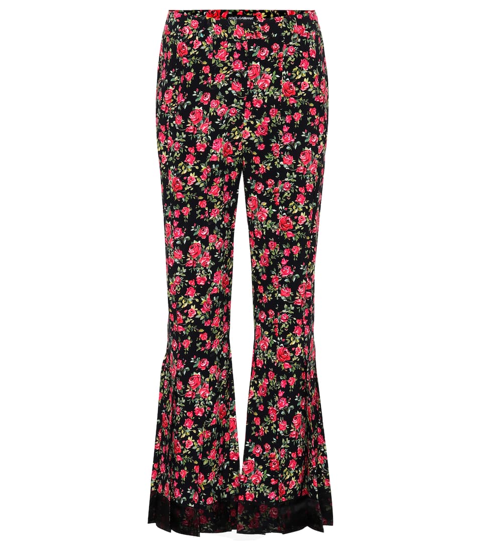 Click to view more detailed imagery on our partner's website Dolce & Gabbana Floral-print Flared Pants In Black