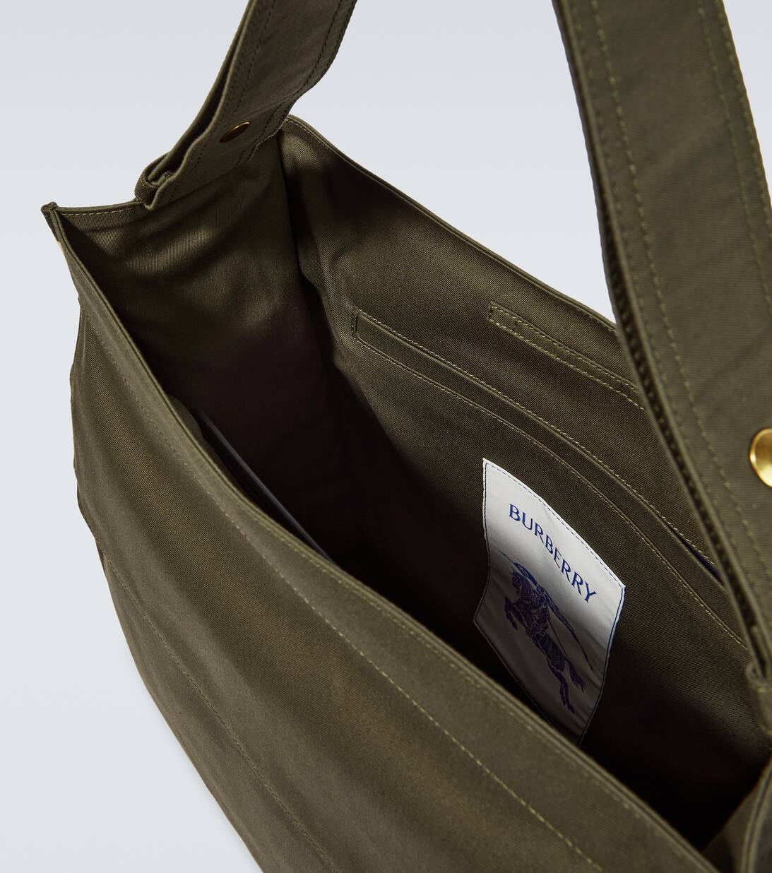 Canvas And Leather Trimmed Messenger Bag in Green Burberry Mytheresa