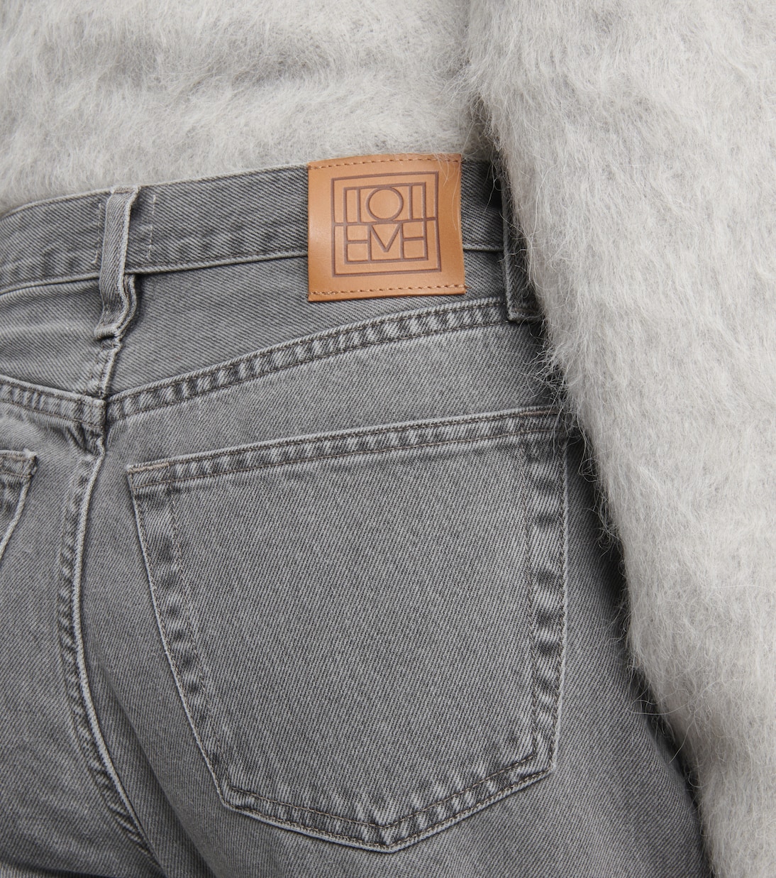 Twisted straight jeans in grey - Toteme | Mytheresa