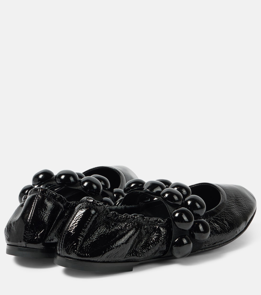 ALAIA SPHERE BALLET FLATS IN SILVER LAMBSKIN