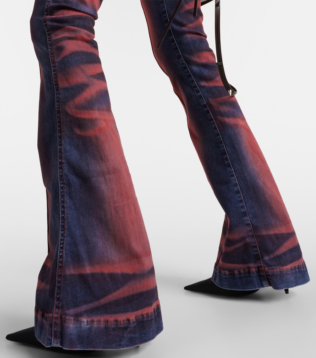 Abstract contrast low rise flared jeans