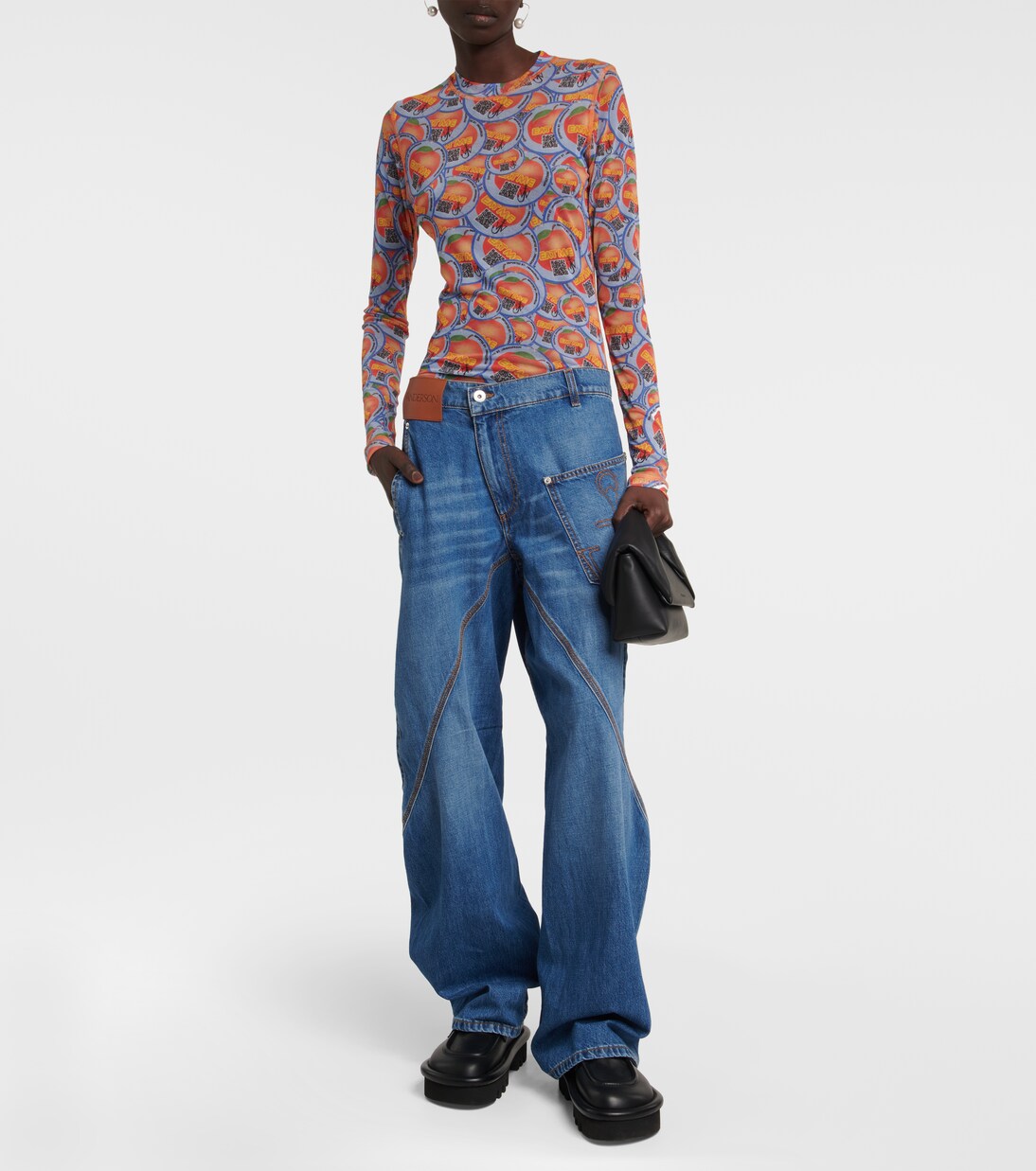 Twisted embroidered wide-leg jeans in blue - JW Anderson | Mytheresa