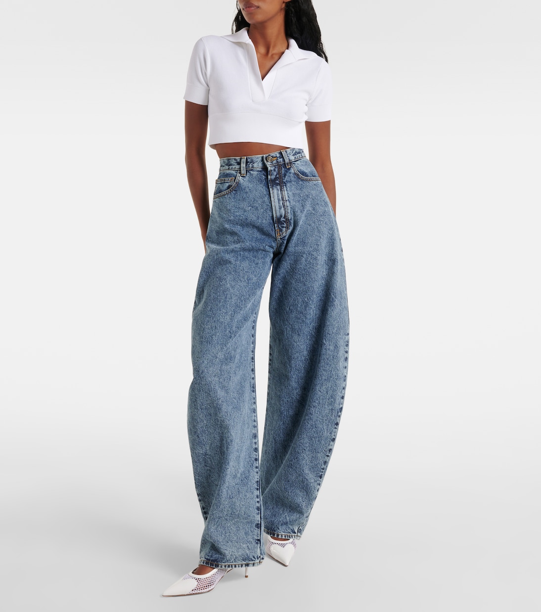 High-rise barrel-leg jeans in blue - Alaia | Mytheresa 