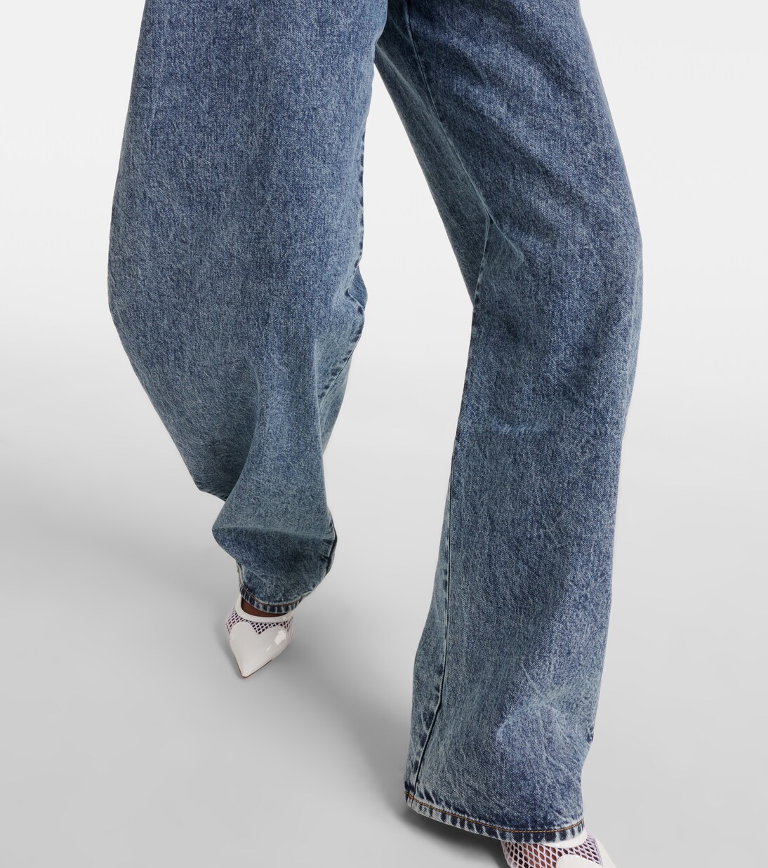 High-rise barrel-leg jeans in blue - Alaia | Mytheresa 