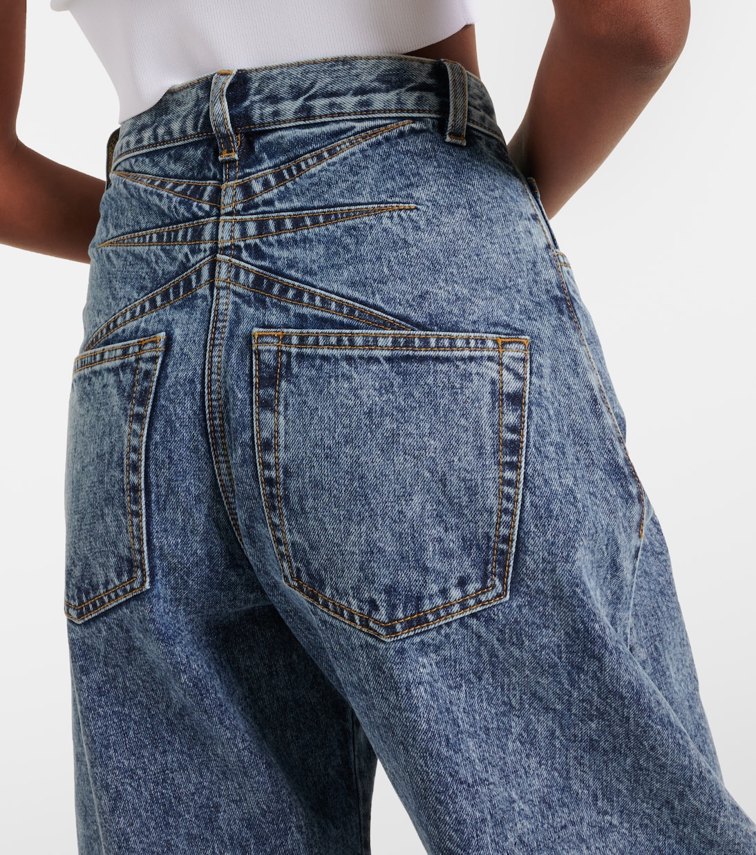 High-rise barrel-leg jeans in blue - Alaia | Mytheresa 