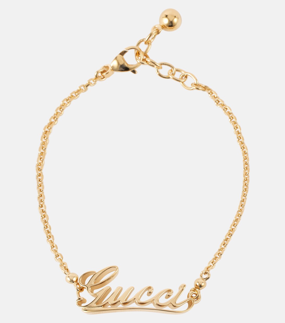 Gucci Script brass bracelet in gold - Gucci | Mytheresa