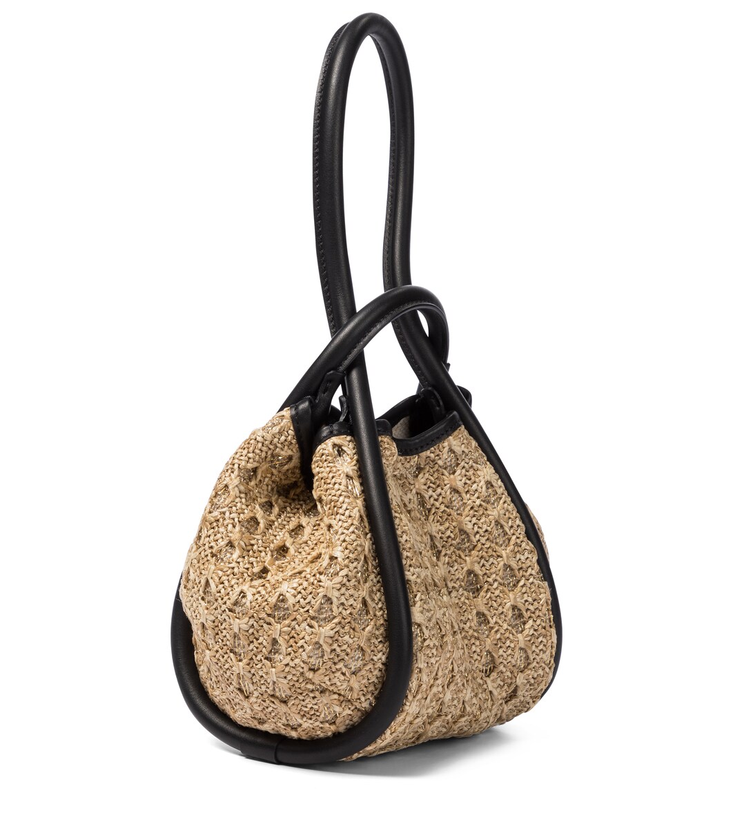 harry styles with gucci bolsas