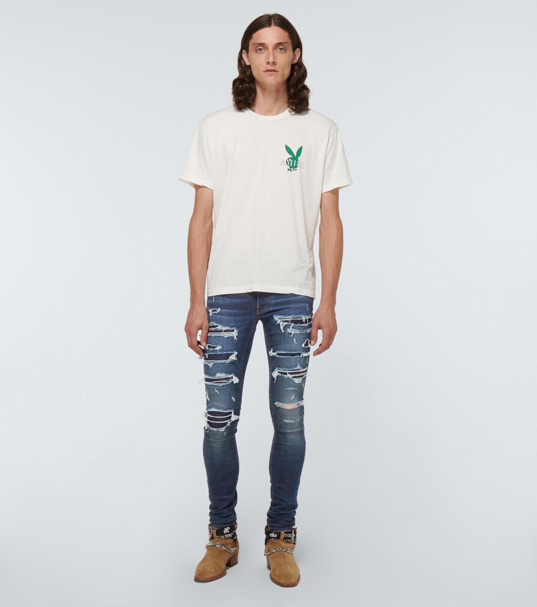 Amiri - Thrasher glitter jeans | Mytheresa