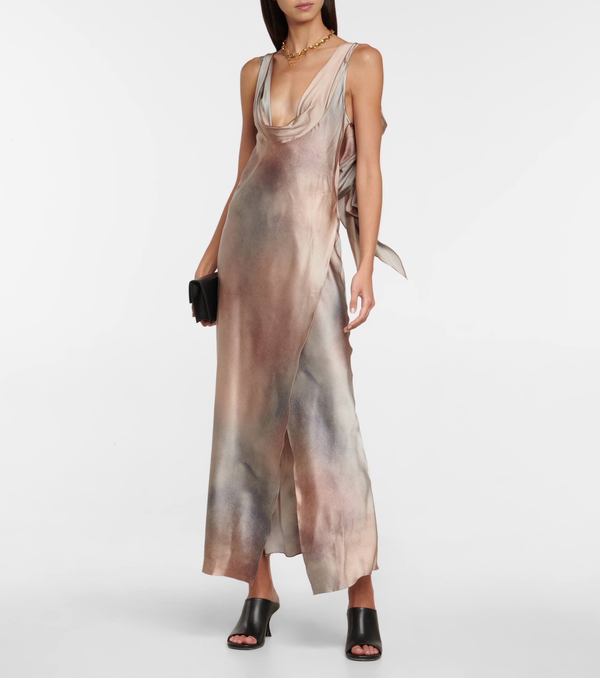 This wrap gown from Acne Studios is made from a stretchy silk-blend with a dreamy, soft-hued ombré print. It has a plunging cowl neck and turns to reveal an open back traced with self-fabric sashes. It has an on trend maxi length and drapey cowl neckline. 
