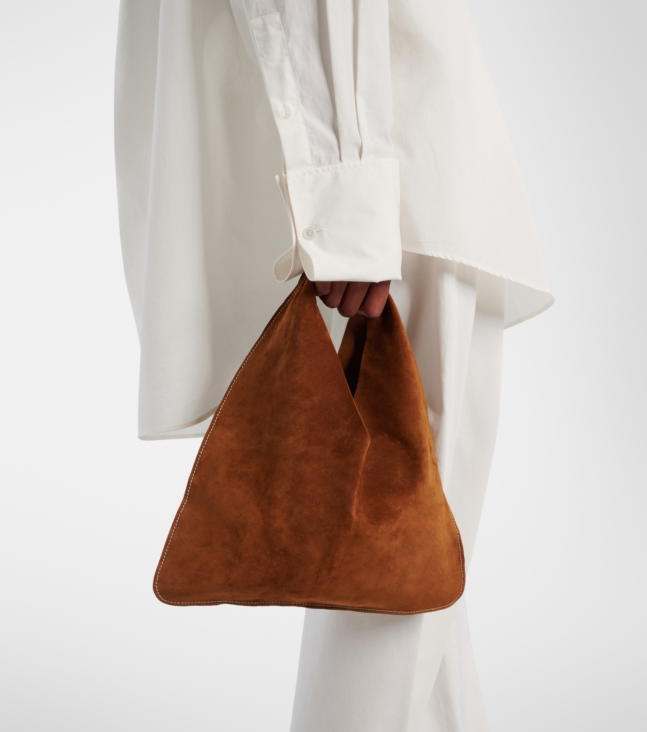 The Row Bindle Small suede top-handle bag