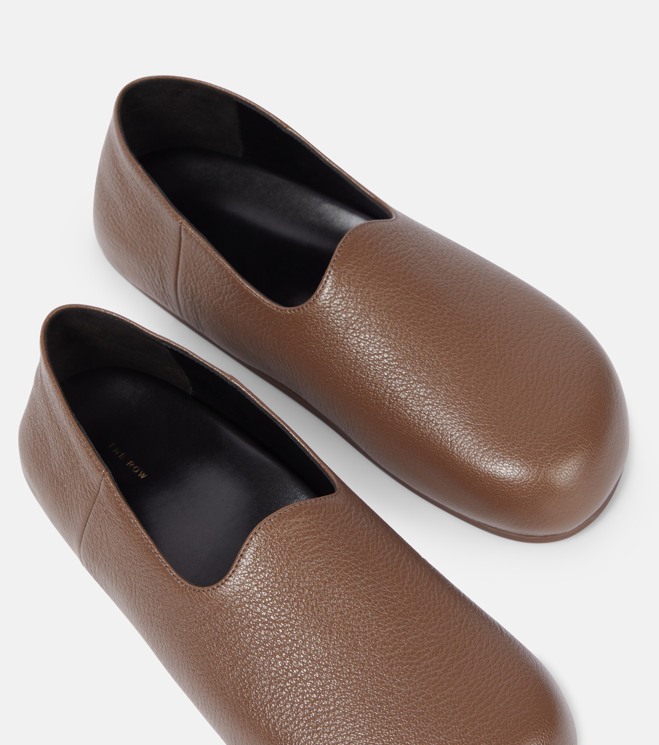 The Row Hugh leather slip-on shoes