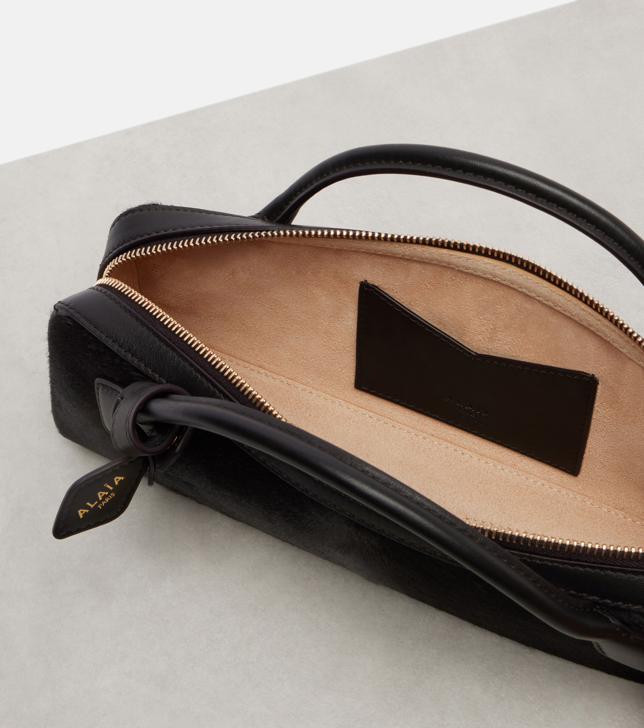 Alaïa Le Teckel Small calf hair clutch