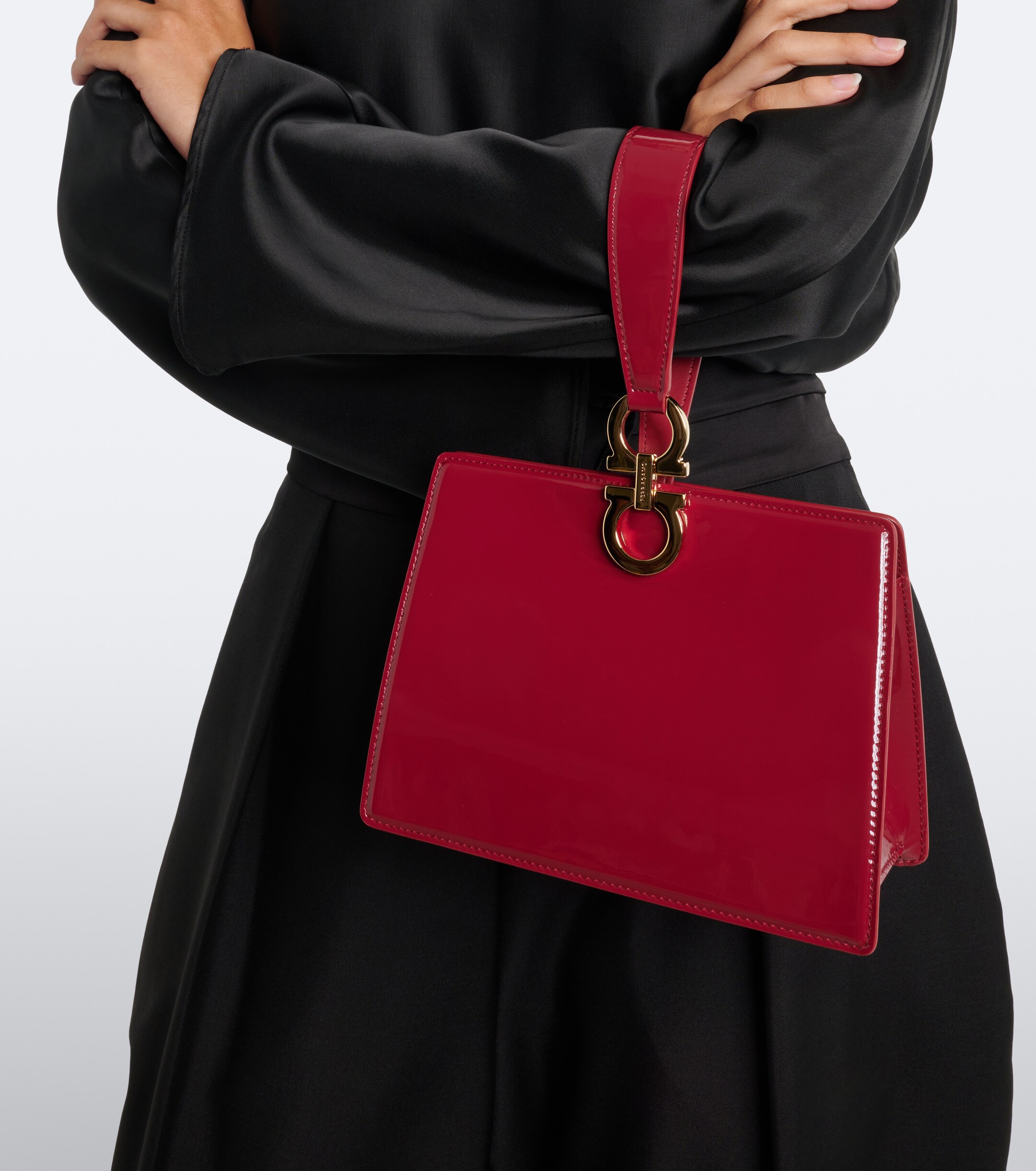 Ferragamo Ferragamo Gancini Small patent leather clutch
