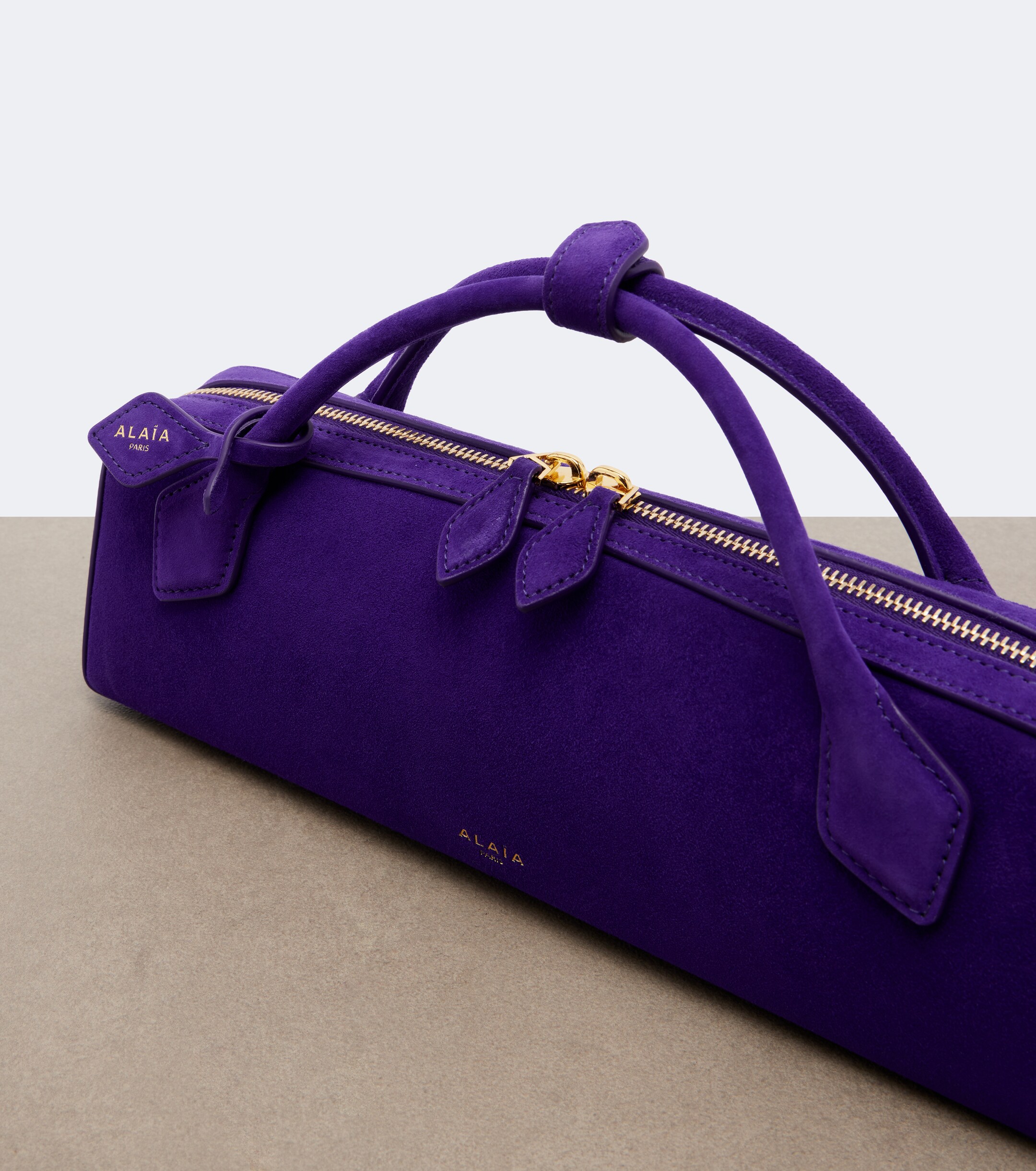 Alaïa Le Teckel Small suede clutch