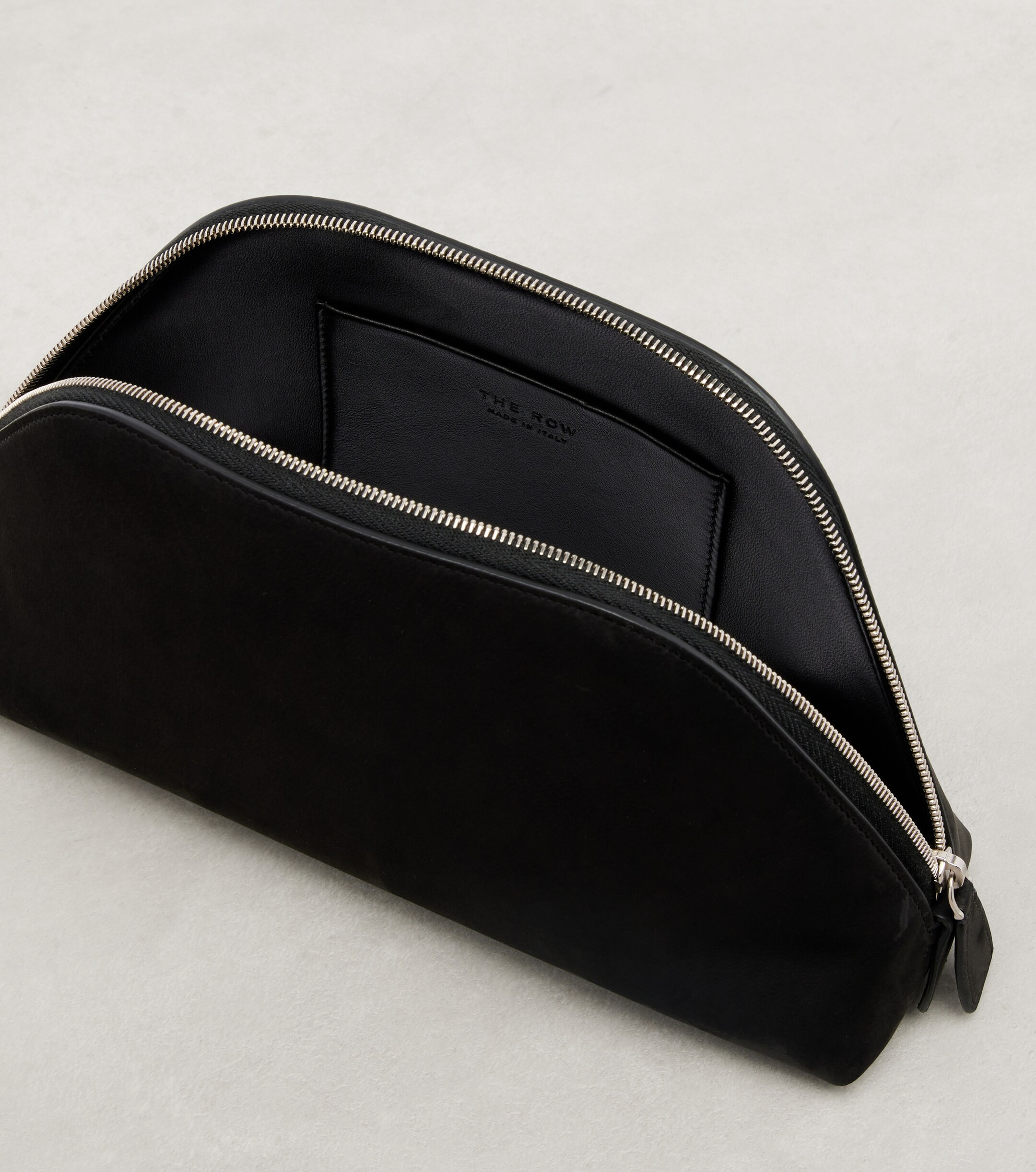 The Row Devon suede clutch
