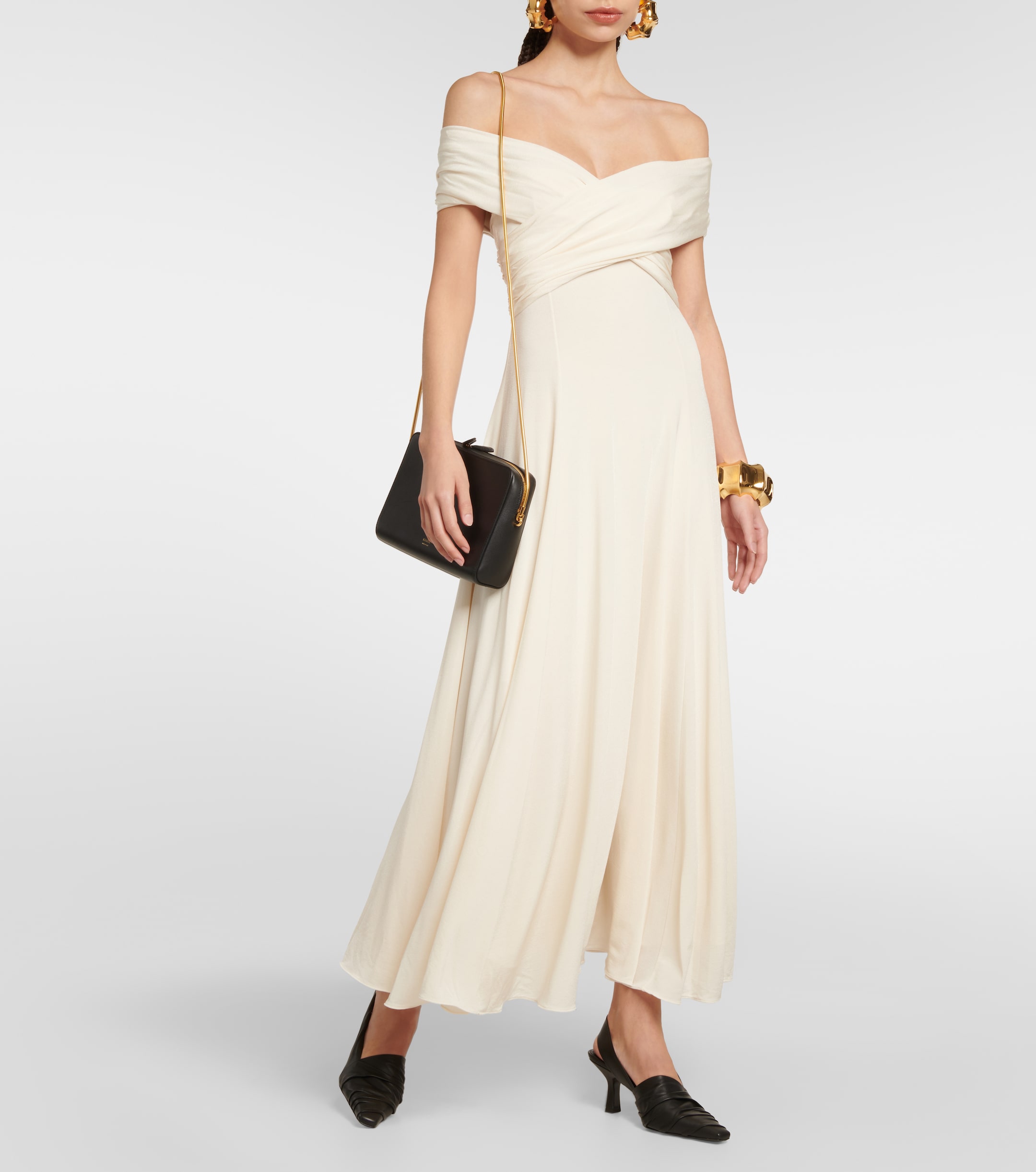KHAITE Bruna off-shoulder crêpe maxi dress