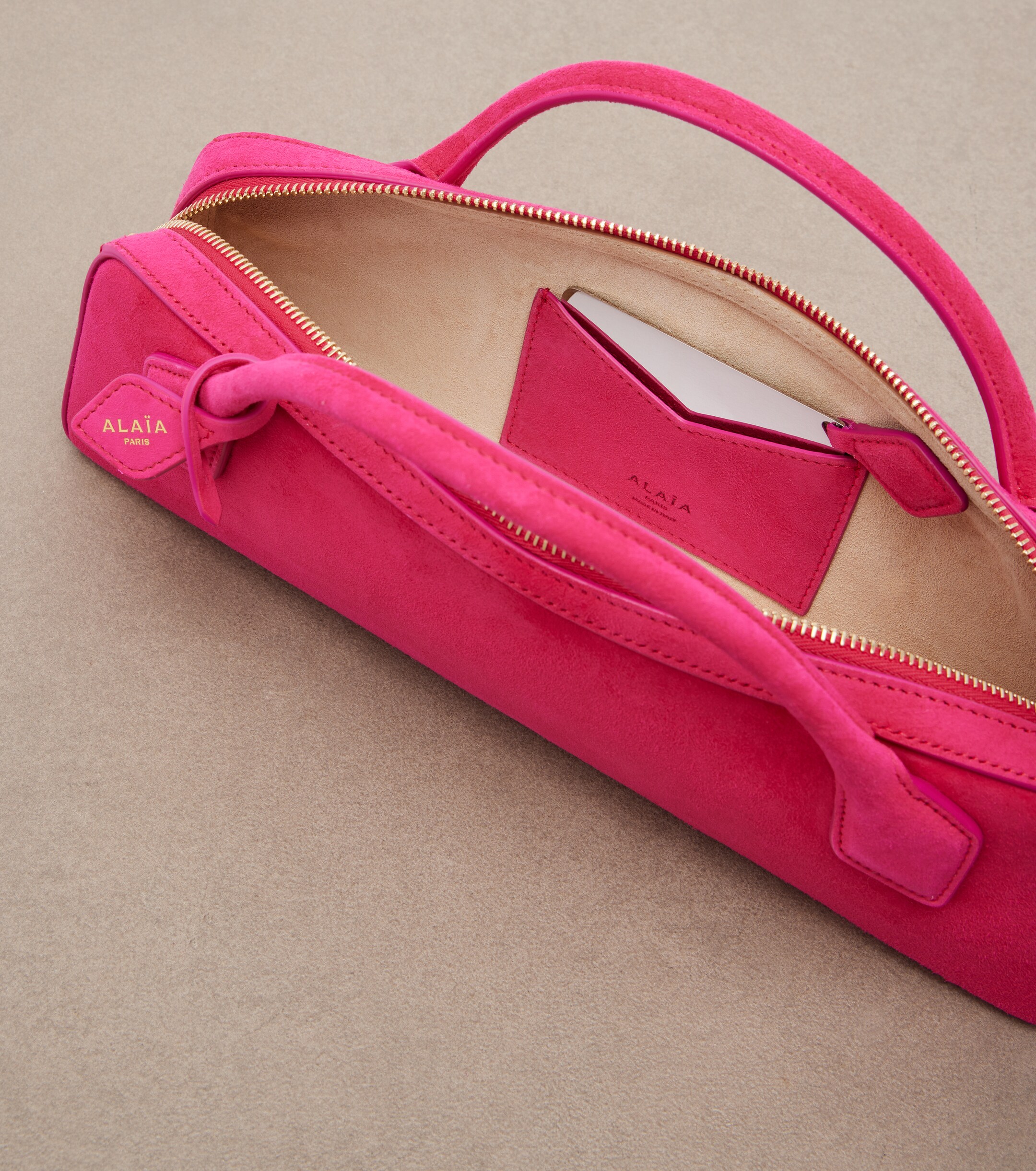 Alaïa Le Teckel Small suede clutch
