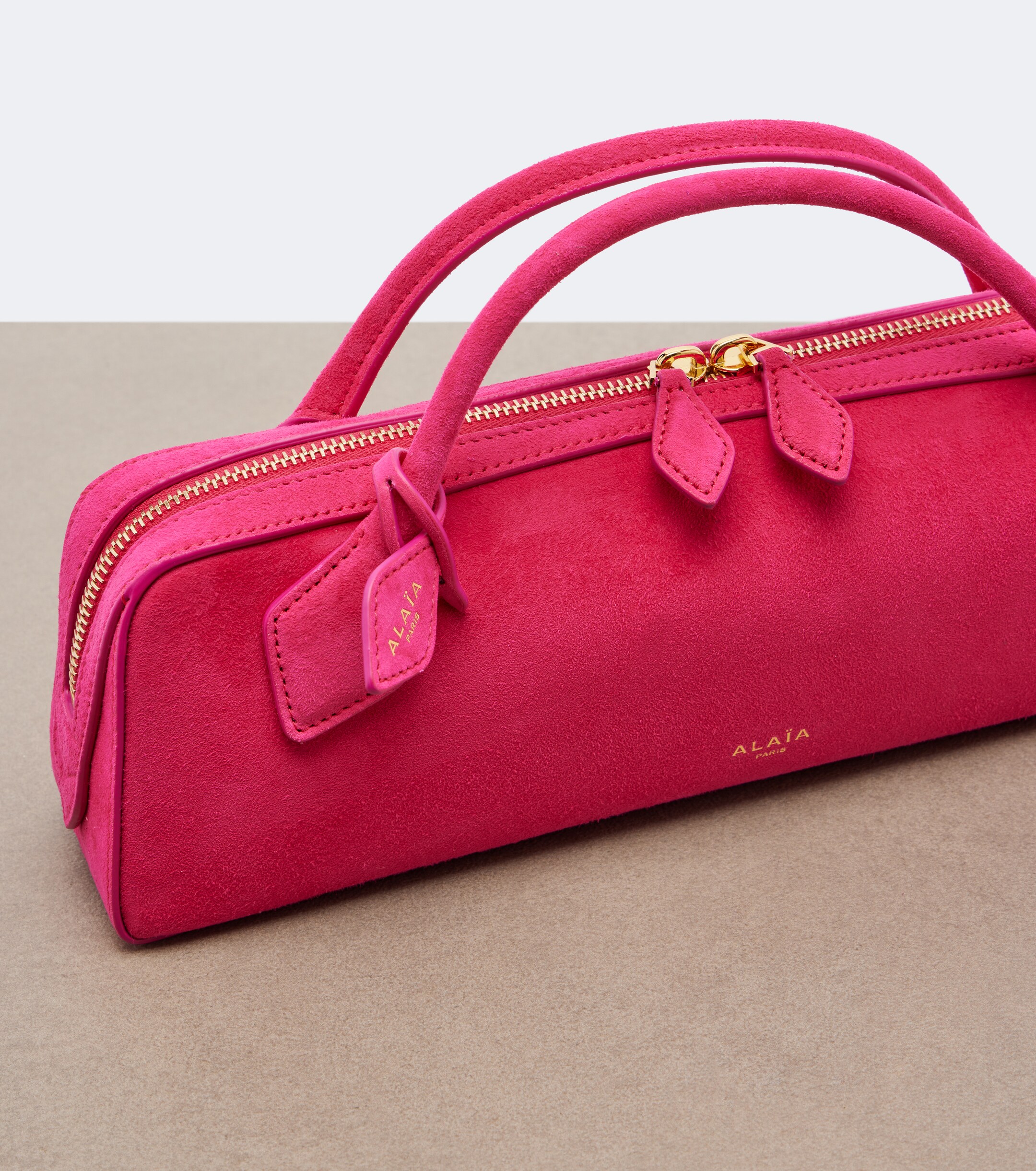 Alaïa Le Teckel Small suede clutch