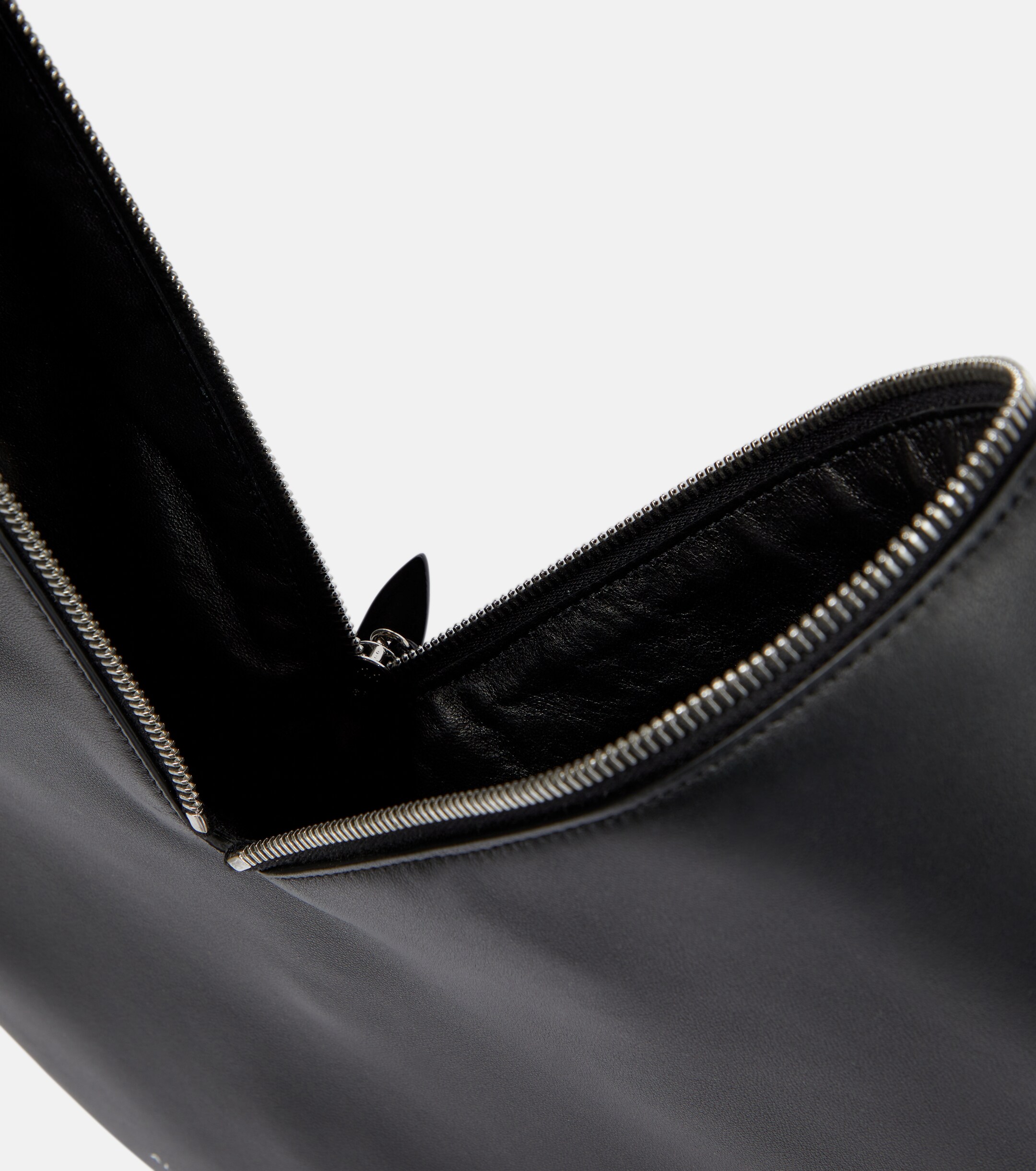 Alaïa Le Cœur leather clutch