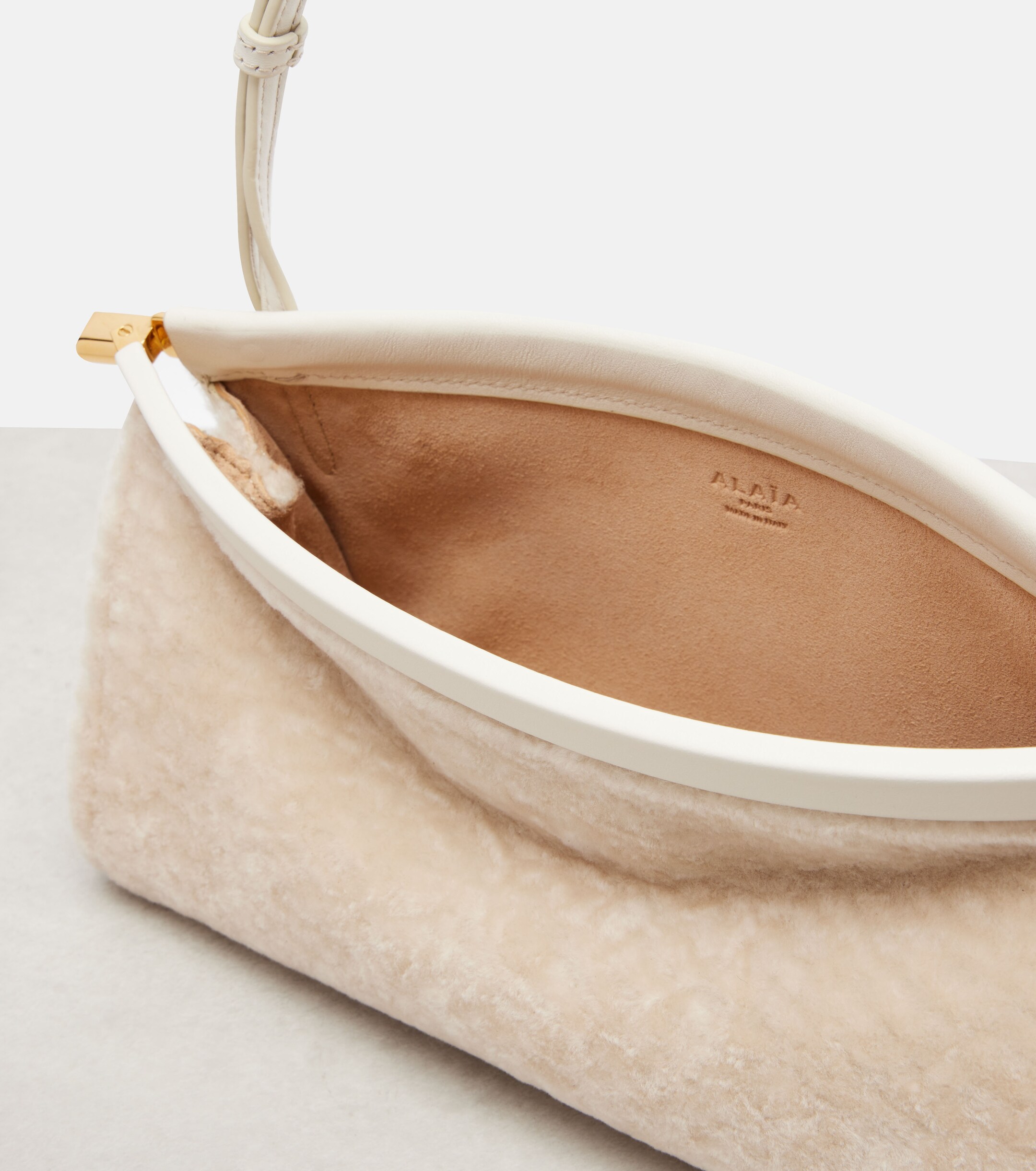 Alaïa Le Click East West Small shearling shoulder bag