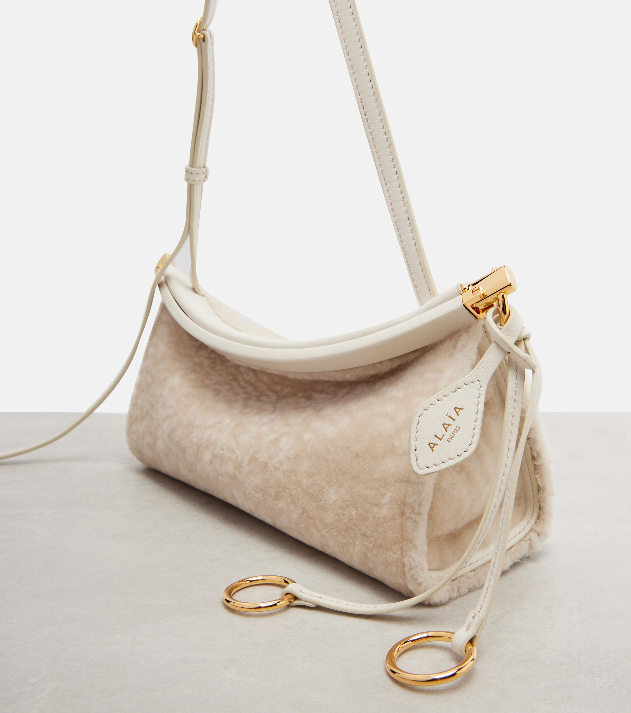 Alaïa Le Click East West Small shearling shoulder bag