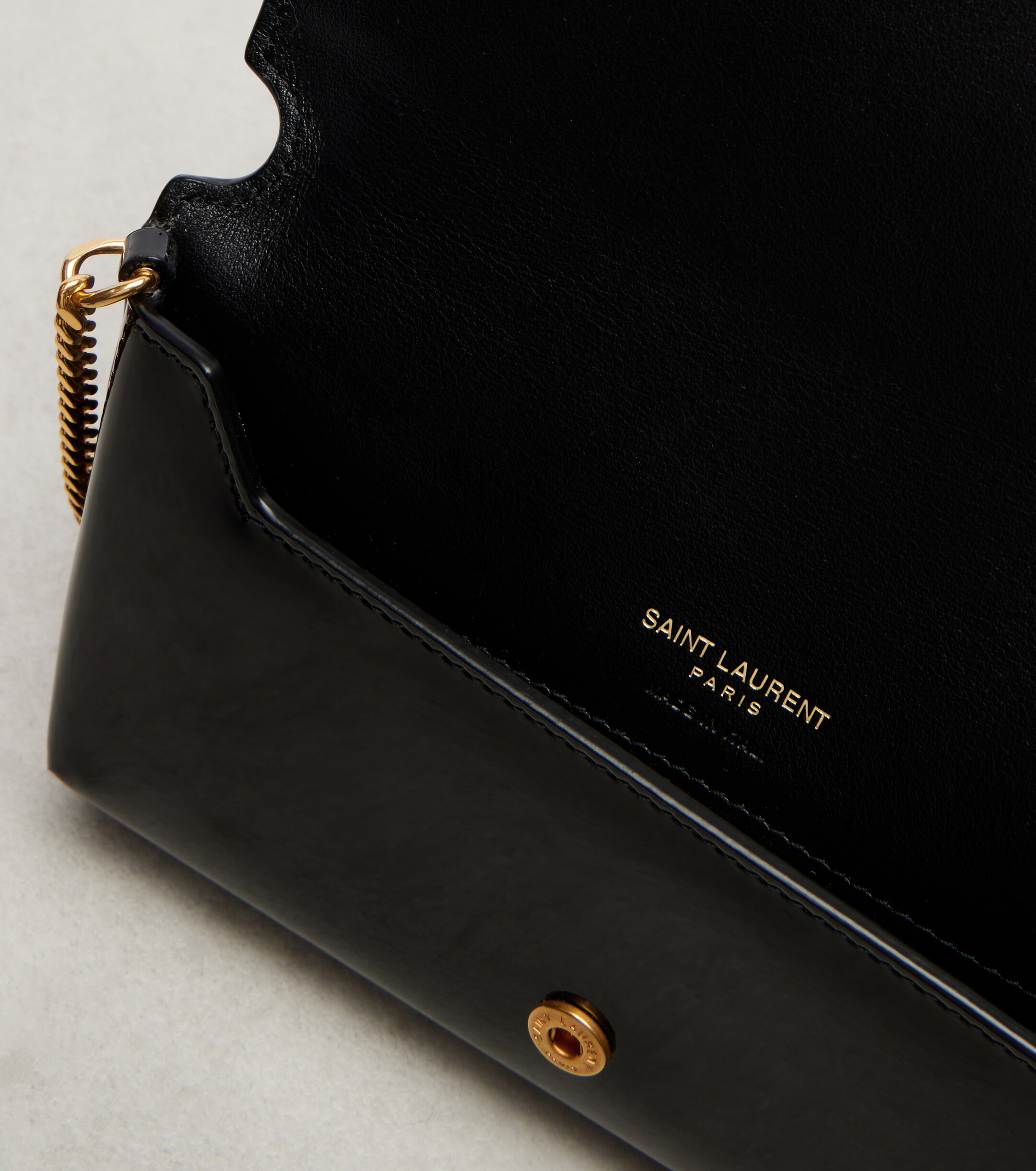 Saint Laurent Cassandre patent leather phone pouch