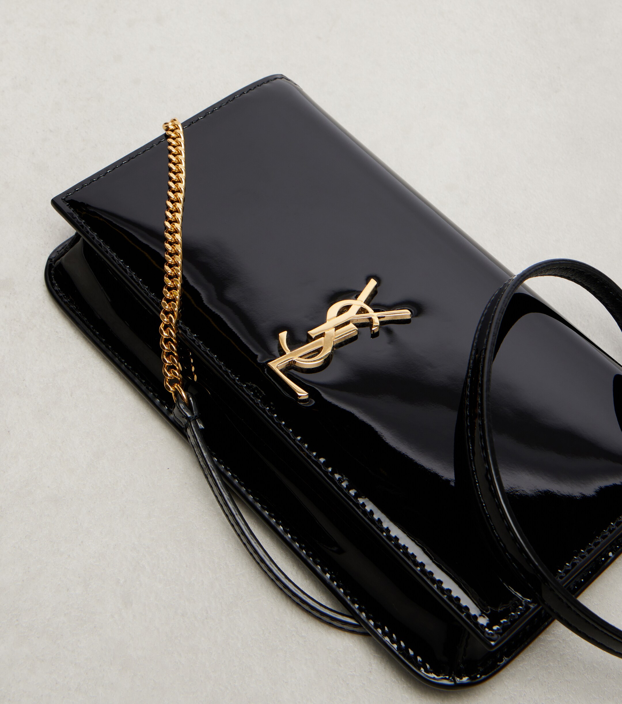 Saint Laurent Cassandre patent leather phone pouch