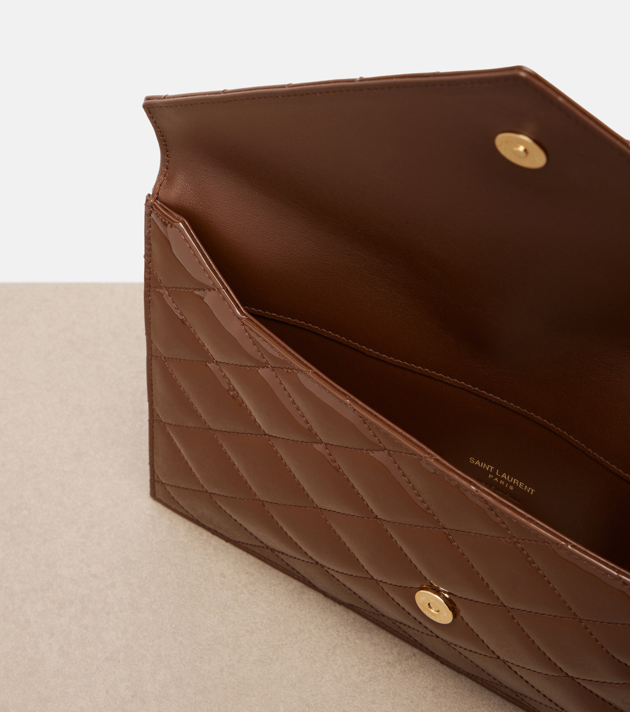 Saint Laurent Paris quilted patent leather pouch