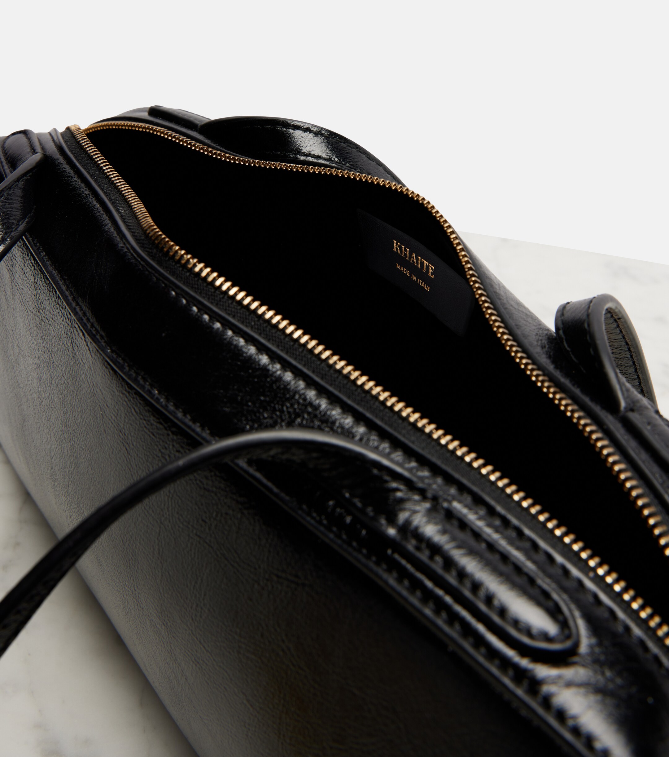 KHAITE Simona patent leather shoulder bag