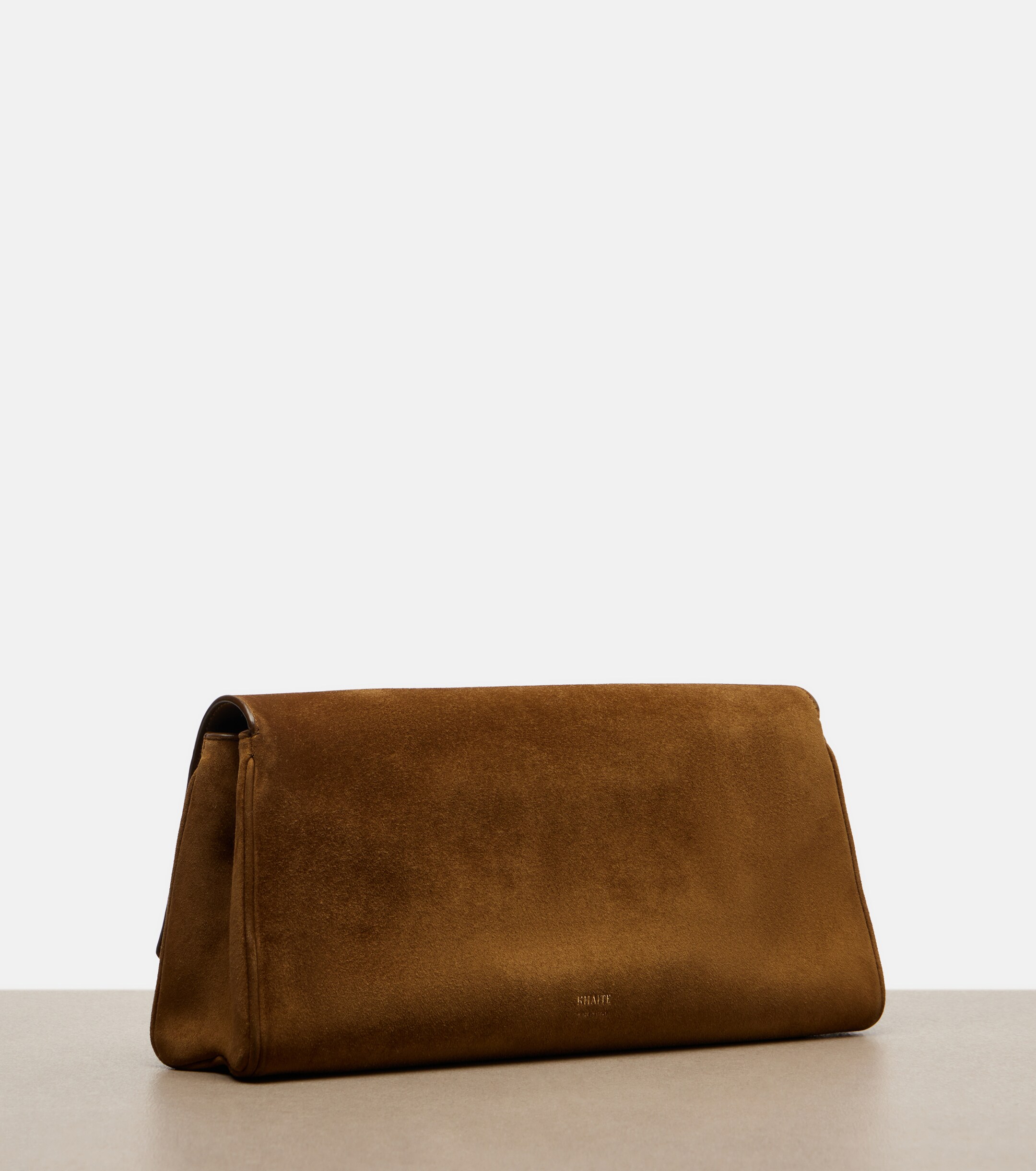 KHAITE Audrey suede clutch