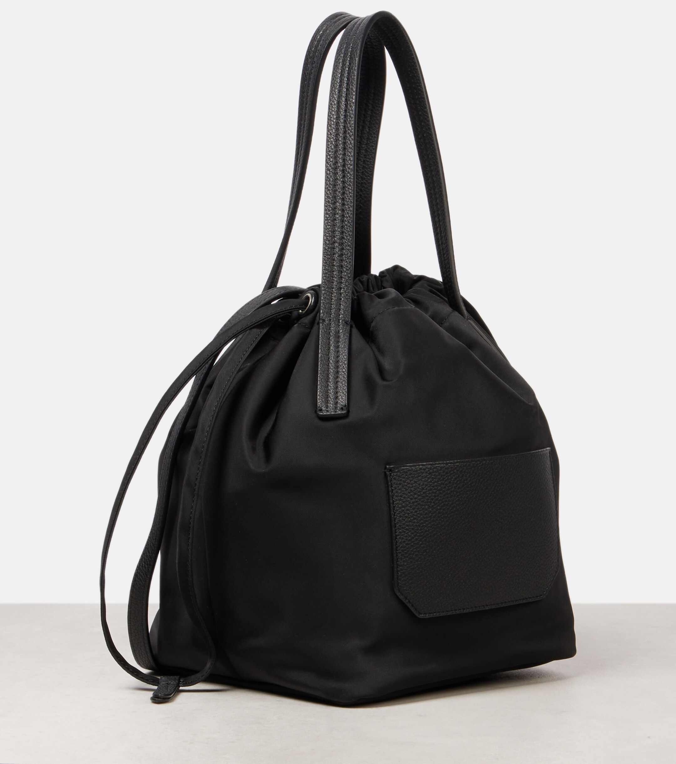 KHAITE Rory Medium leather-trimmed bucket bag