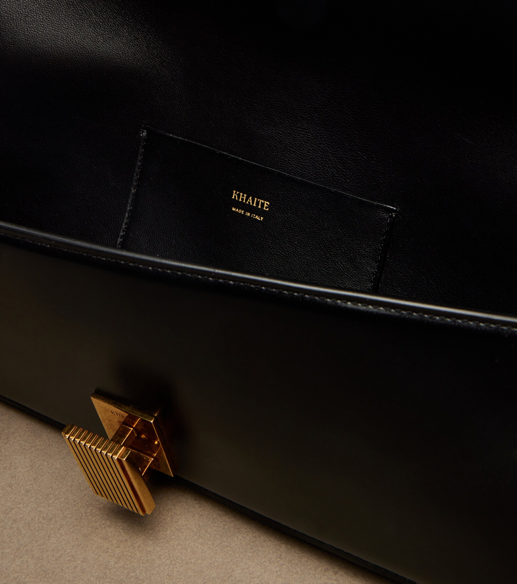 KHAITE Blake leather clutch