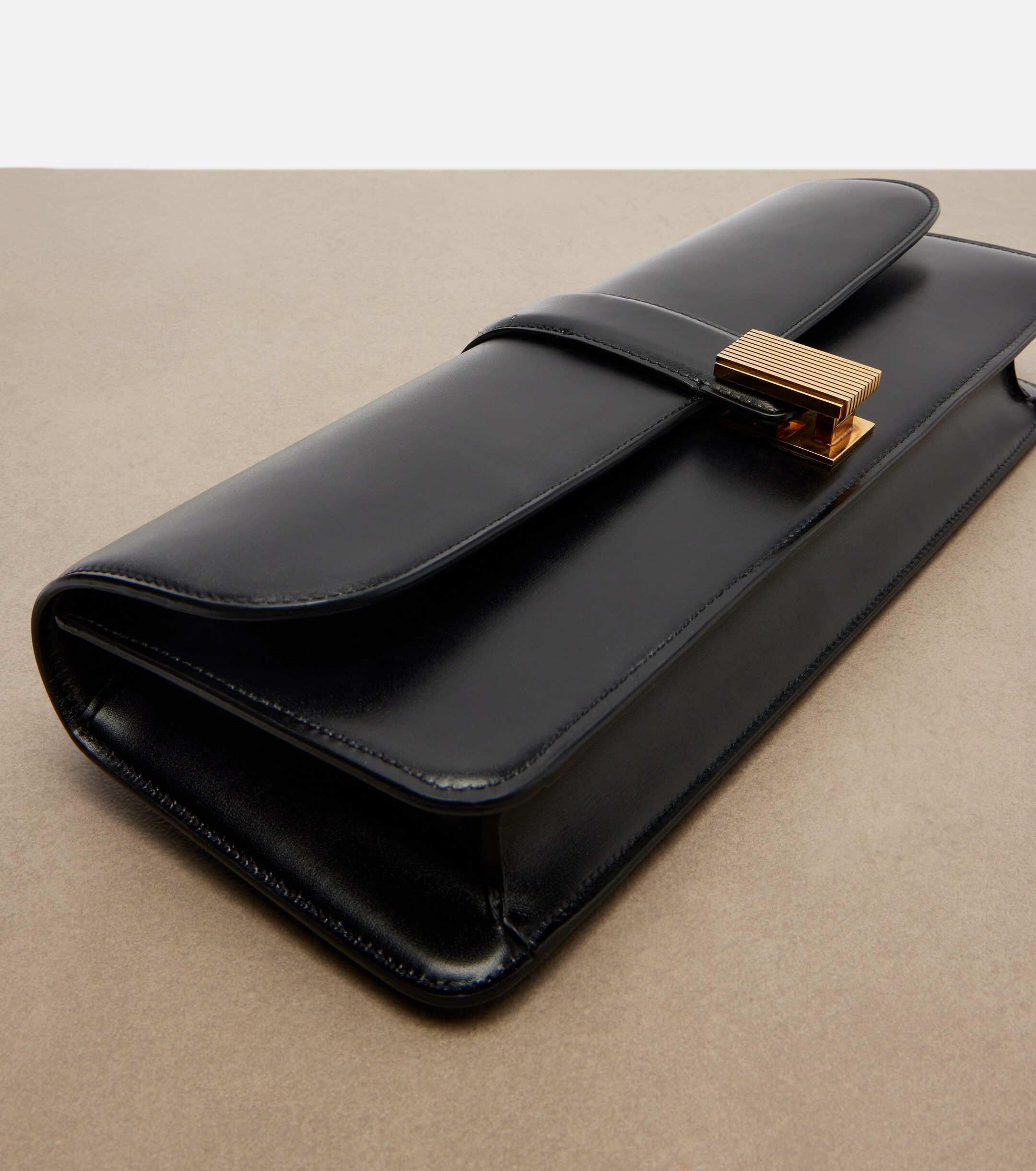 KHAITE Blake leather clutch